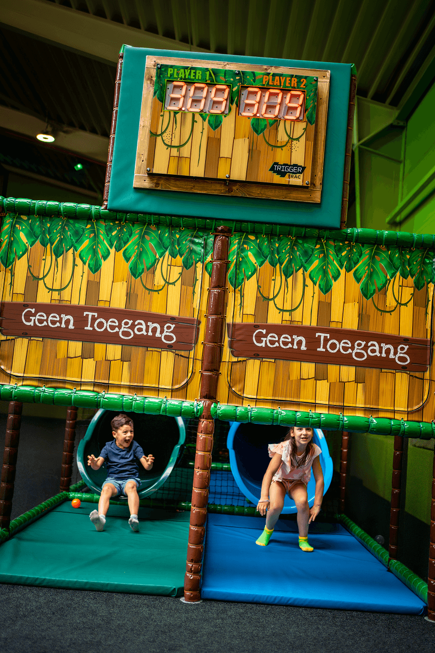 Children coming put of slides at end of Triggertrac course