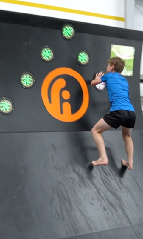 Interactive warped wall. How many times can you reach the top?